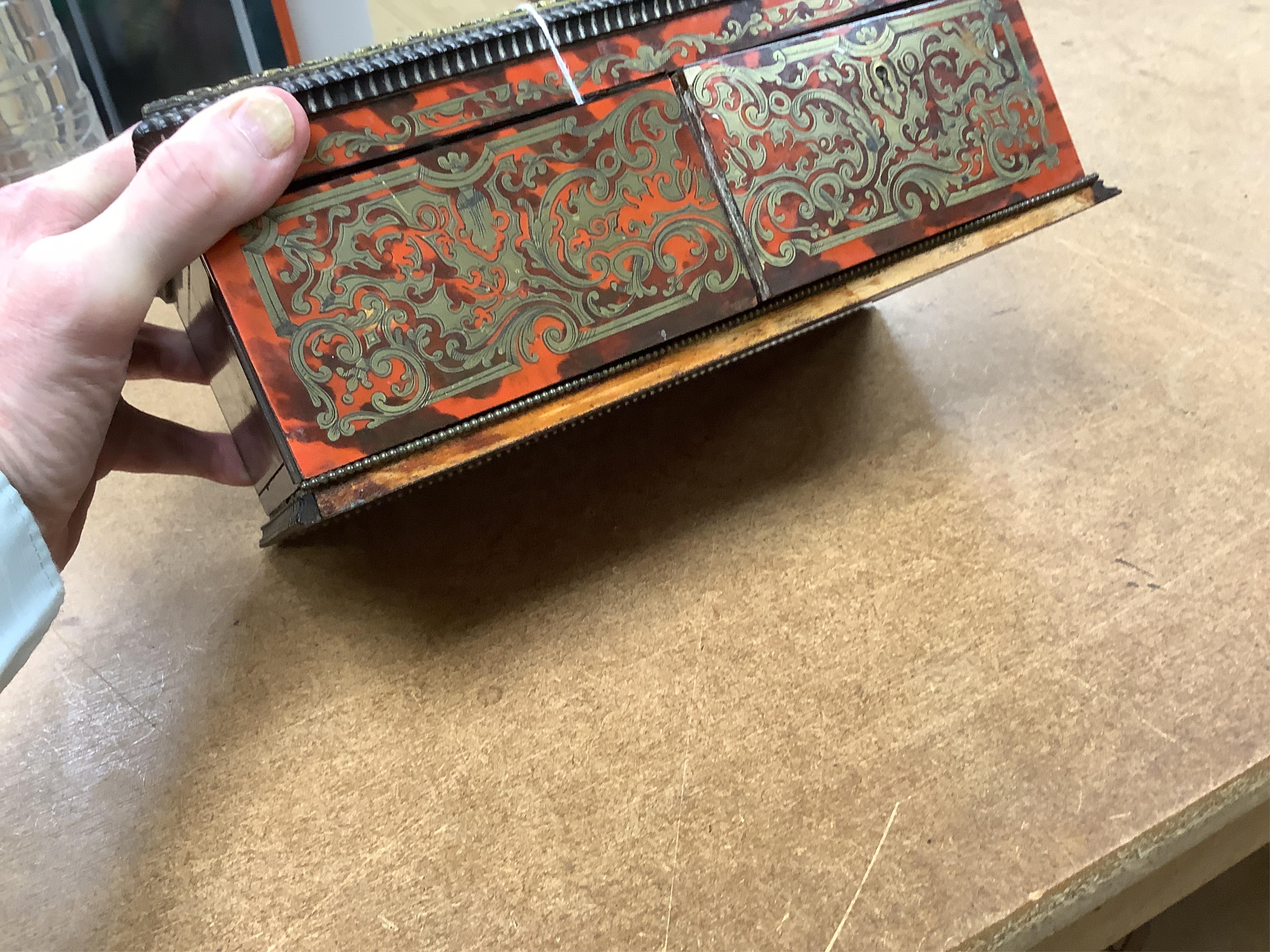 A 19th century French boullework glove box, signed Tahan, Rue de la Paix, width 27cm.